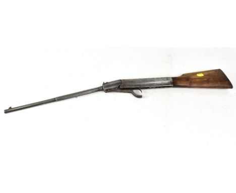 An early 20th century break-barrel air rifle, possibly Diana Model 1, with hexagonal and round barrel, wood stock with impres