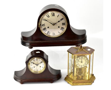An early 20th century German HAC Napoleon hat eight day mantel clock, the silvered dial set with Roman numerals, with chain-d