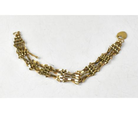 A 9ct gold five bar gate bracelet with a 9ct gold heart-shaped lock clasp, length approx 17cm, approx 6g (af). CONDITION REPO