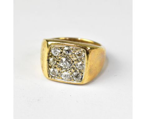 A gentlemen's 9ct gold signet ring, square table with central diamond surrounded by eight small diamonds, size U, carat weigh