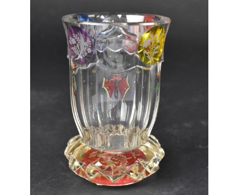 A 19th century Bohemian glass with eight circular panels to the rim in a variety of colours, blue, purple, red, clear and amb