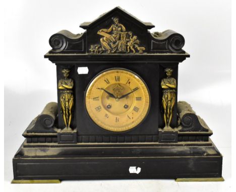A late 19th century French black slate mantel clock with figural columns flanking the circular dial, height 32cms. CONDITION 