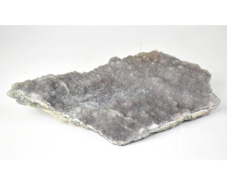 A large amethyst cluster, length approx 35.5cm.
