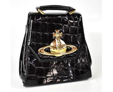 VIVIENNE WESTWOOD; a black patent mock croc leather handbag, the front fold-over flap set with gold tone orb logo magnetic cl