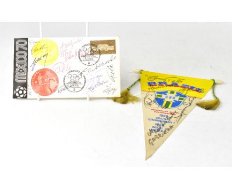 BRAZIL FOOTBALL; a pennant bearing numerous signatures including Pelé and a first day cover with multiple signatures (2).We h