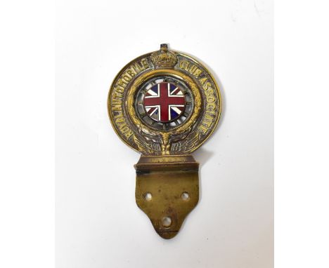 A vintage brass and enamelled RAC (Royal Automobile Club Association), membership grille badge made by Collins of London, cen
