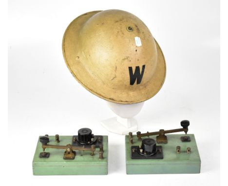 A WWI Brodie-type Warden's helmet, together with two Morse code machines (3).