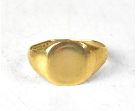 A 9ct gold signet ring with plain table, size U, approx 4.7g. CONDITION REPORT The shank is worn and misshapen and it will ne