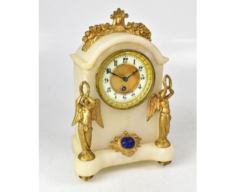 A late 19th century French white onyx and gilt metal mounted mantel clock, the chapter ring set with Arabic numerals, height 