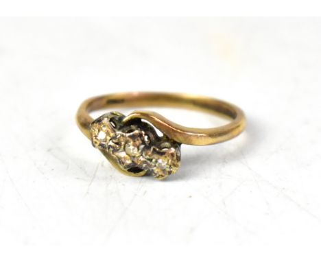 A 9ct gold three-stone diamond ring, the three tiny illusion set diamonds on a crossover 9ct gold shank, size Q/R, approx 2.8