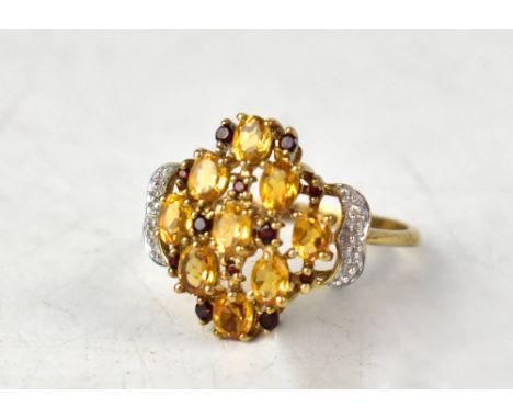 A 9ct yellow gold ring set with a cluster of Madeira citrine and Mozambique garnet stones, size U, approx 3g.