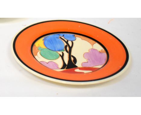 CLARICE CLIFF; a 'Pastel Autumn' pattern side plate, hand painted with stylised tree, cottage and landscape, within an orange