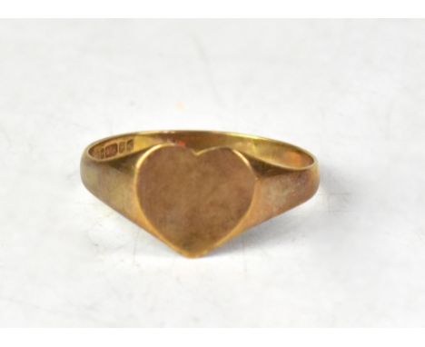 A very large 9ct rose gold signet ring, with a heart-shaped top, inside diameter approx 23.8mm, approx 3.3g. CONDITION REPORT