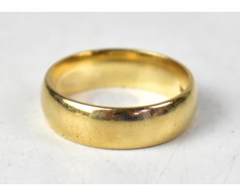 A 9ct hallmarked wide band ring, size V, approx 7.5g. CONDITION REPORT Marks to band B Bros 375