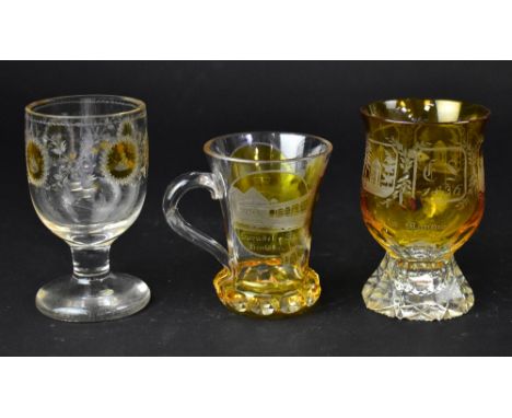 Three 19th century Bohemian glasses comprising a clear glass example with amber overlay small vignettes, with cornucopia with