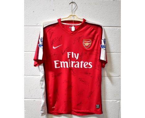 ARSENAL; a c2008 Nike football shirt, with 'Fabregas 4' verso, bearing signature to number 4 and several signatures to front.