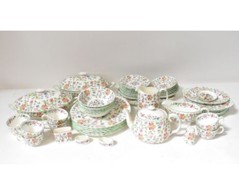 MINTON; a quantity of 'Haddon Hall' pattern dinner ware to include teapot, six teacups and saucers, twelve side plates, diame