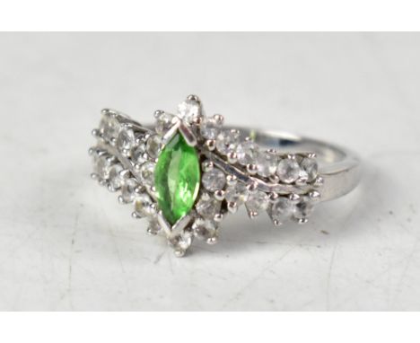 A 9ct white gold ring set with Tsavorite and white topaz ring, size O, approx 3.4g. CONDITION REPORT Overall good condition, 