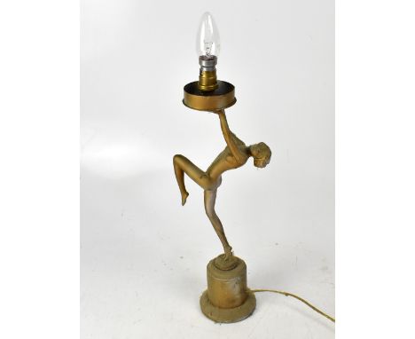 An Art Deco style gilded table lamp modelled as a nude female, with crackle-effect globular shade, height 54cm. CONDITION REP