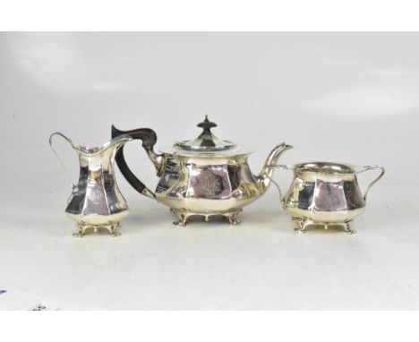 An Edwardian three-piece hallmarked silver tea service comprising teapot, 14 x 26cm, sucrier  8.5 x 16cm, and cream jug, heig