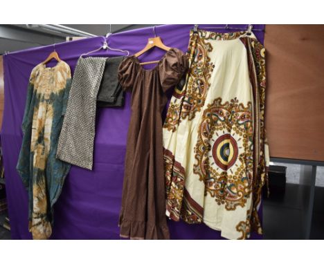 A mixed lot of vintage clothing, predominantly 1960s and 70s including ethnic print wrap skirt and more.
