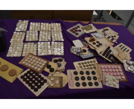 A wonderful array of vintage and antique buttons, predominantly on cards,including a large lot of mother of pearl.