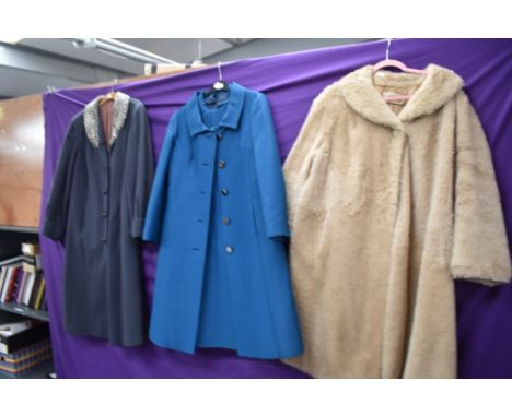 A 1960s jacket and dress set in teal blue, a Wool swing coat with astrakhan or similar collar and a pure Alpaca pile windsmoo