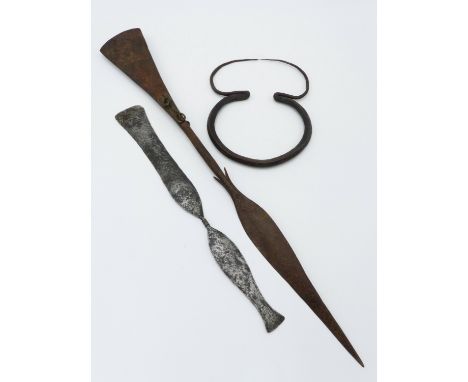 A WEST AFRICAN IRON CURRENCY SPEAR WITH BARBED SPEAR POINT  AND  FLATTENED AXE BLADE OPPOSING 52 CM LONG, A SMALLER EXAMPLE A