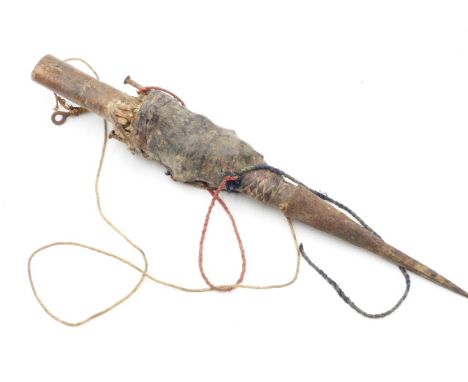 A GOOD WEST AFRICAN HUNTERS OR FISHER MANS FETISH. IRON SPIKED WOODEN SHAFT WRAPPED IN ANIMAL SKIN AND CONTAINING BONES , SEE