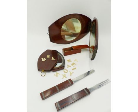 A 19TH CENTURY MAHOGANY CAMPAIGN FOLDING READING STAND WITH EASEL BACK, A MAHOGANY CASED FOLDING MIRROR, A SIMILAR SMALLER EX