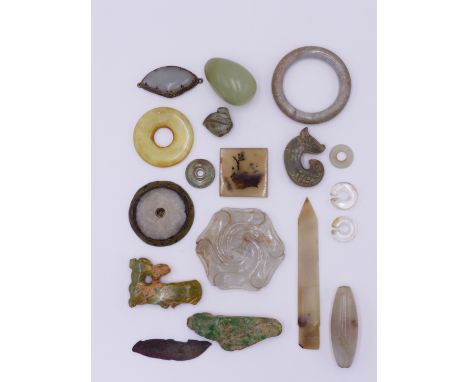A COLLECTION OF ORIENTAL ARCHAISTIC JADE AND HARDSTONE ARTIFACTS. A CHINESE "PIG DOG" AMULET, THREE BI DISCS, A JADE KNIFE BL