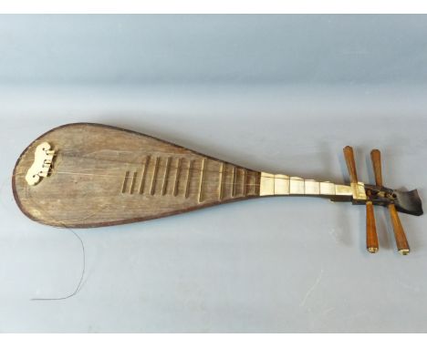 A CHINESE LUTE OR PIPA, OF TRADITIONAL ONE PIECE BOWL BACK DESIGN WITH IVORY FRETS AND SIGNATURE PLAQUE  97 CM LONG