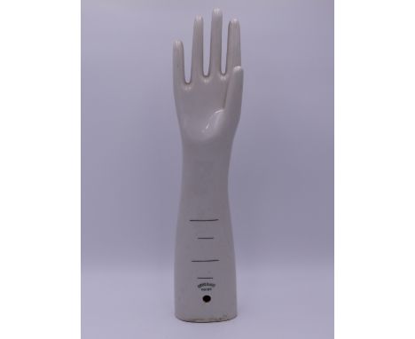 A VINTAGE WHITE GLAZED CERAMIC GLOVE MOULD BY OYEHENART VICHY. 43.5 CM TALL