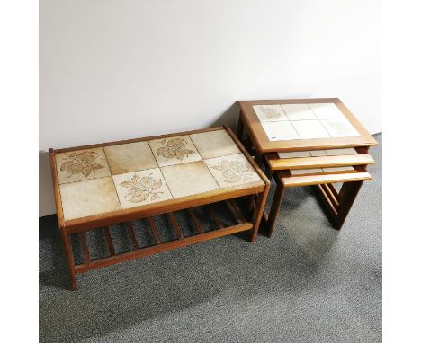 A nest of three tile topped tables together with a similar tile topped coffee table with ladder rack shelf, 85 x 46cm.