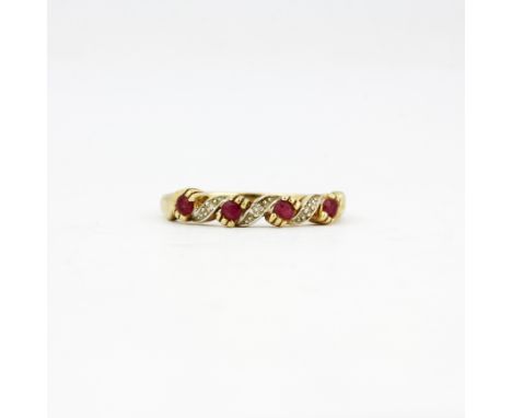 A 9ct yellow gold ruby and diamond set ring, (R ).