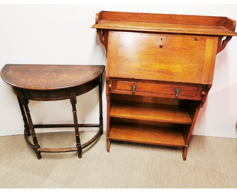 A 20th C oak bureau A/F to foot H. 110cm together with an oak, single drawer console table, H. 71cm.