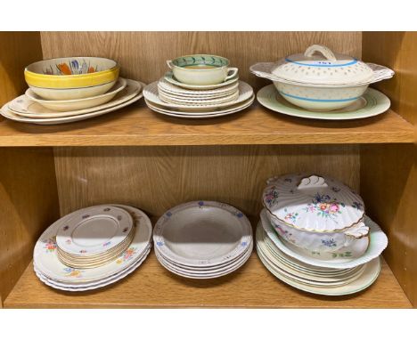 A quantity of mixed Clarice Cliff china items.