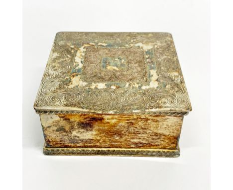 A cased German Nazi enamelled SS badge together with five 1935 Hitler coins contained in a silver plated cigarette box.