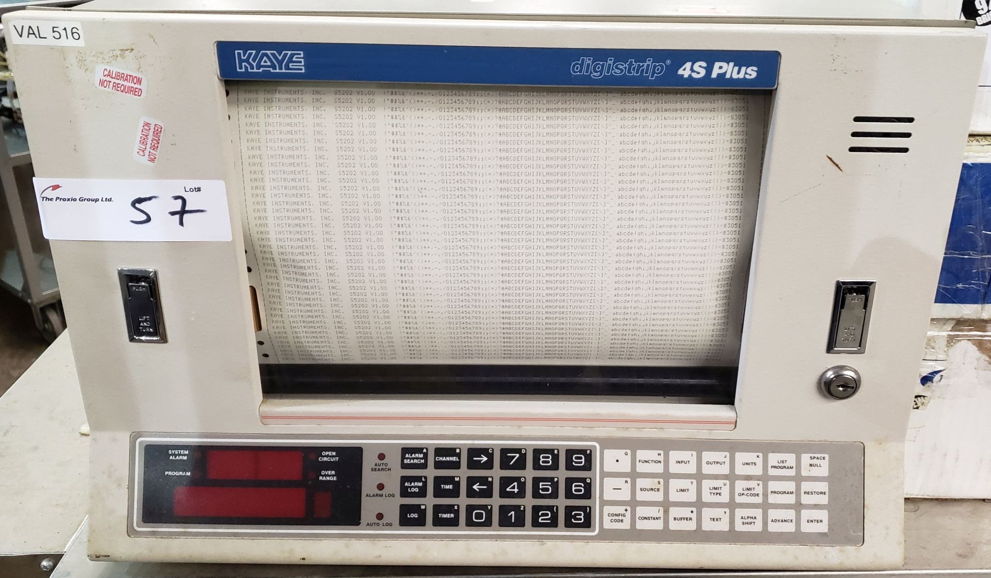 Kaye Digistrip Validator, Model 4S, with (2) boxes of printer paper.