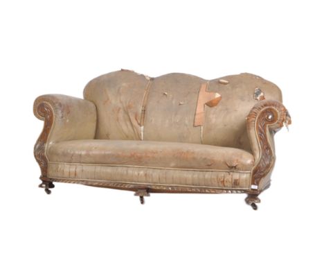 Continental leather serpentine fronted camel back sofa settee. Raised on large claw and ball feet having S-scroll fronted arm