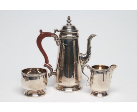 A SILVER THREE PIECE COFFEE SET, maker C.S. Green &amp; Co. Ltd., Birmingham, comprising tapering cylindrical coffee pot (197