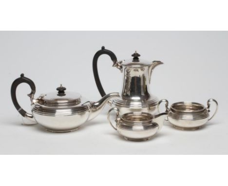 A SILVER FOUR PIECE TEA AND COFFEE SERVICE, maker Blackmore &amp; Fletcher Ltd., London 1923, of squat baluster form with rib