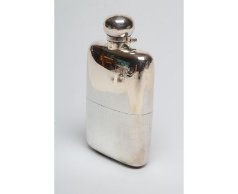 A LATE VICTORIAN SILVER HIP FLASK, maker Drews, London 1896, of plain rounded oblong form with removable sleeve and hinged sc