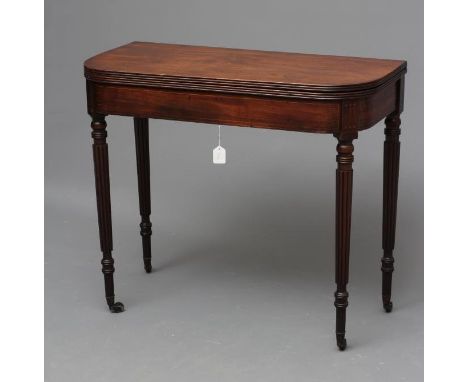 A REGENCY MAHOGANY FOLDING TEA TABLE of rounded oblong form with reeded edged top, plain frieze with key stringing, raised on