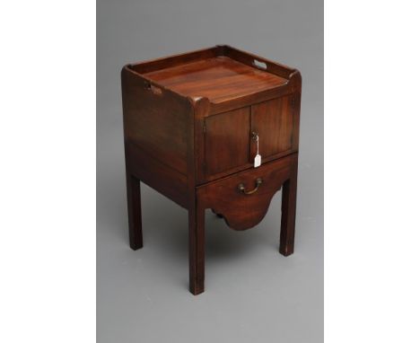 A GEORGIAN MAHOGANY BEDSIDE COMMODE, 3rd quarter 18th century, of oblong form, the tray top pierced with handles, two cupboar