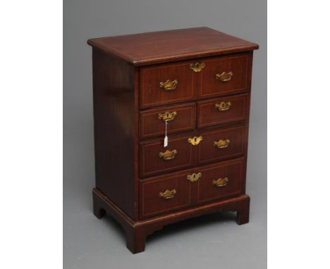 A SMALL MAHOGANY SECRETAIRE CHEST, in the Georgian style, early 20th century using old wood, the moulded edged rounded and ba