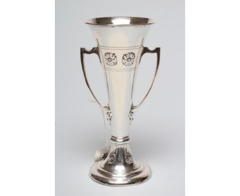 AN EDWARDIAN SILVER ART NOUVEAU VASE, maker Ackroyd Rhodes, London 1907, of trumpet form with two angular handles, chased in 