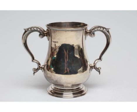 A LATE VICTORIAN SILVER LOVING CUP TROPHY, maker's mark rubbed, London 1889, of baluster form with two acanthus sheathed doub