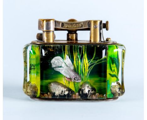 A DUNHILL LUCITE AQUARIUM TABLE LIGHTER by Margaret Bennett, with plated brass mechanism, the four panels all with green shad