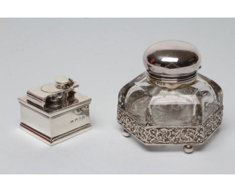 A LATE GEORGE III SILVER TRAVELLING INKWELL, no maker's mark, London 1813, of plain square section, the screw down hinged cov